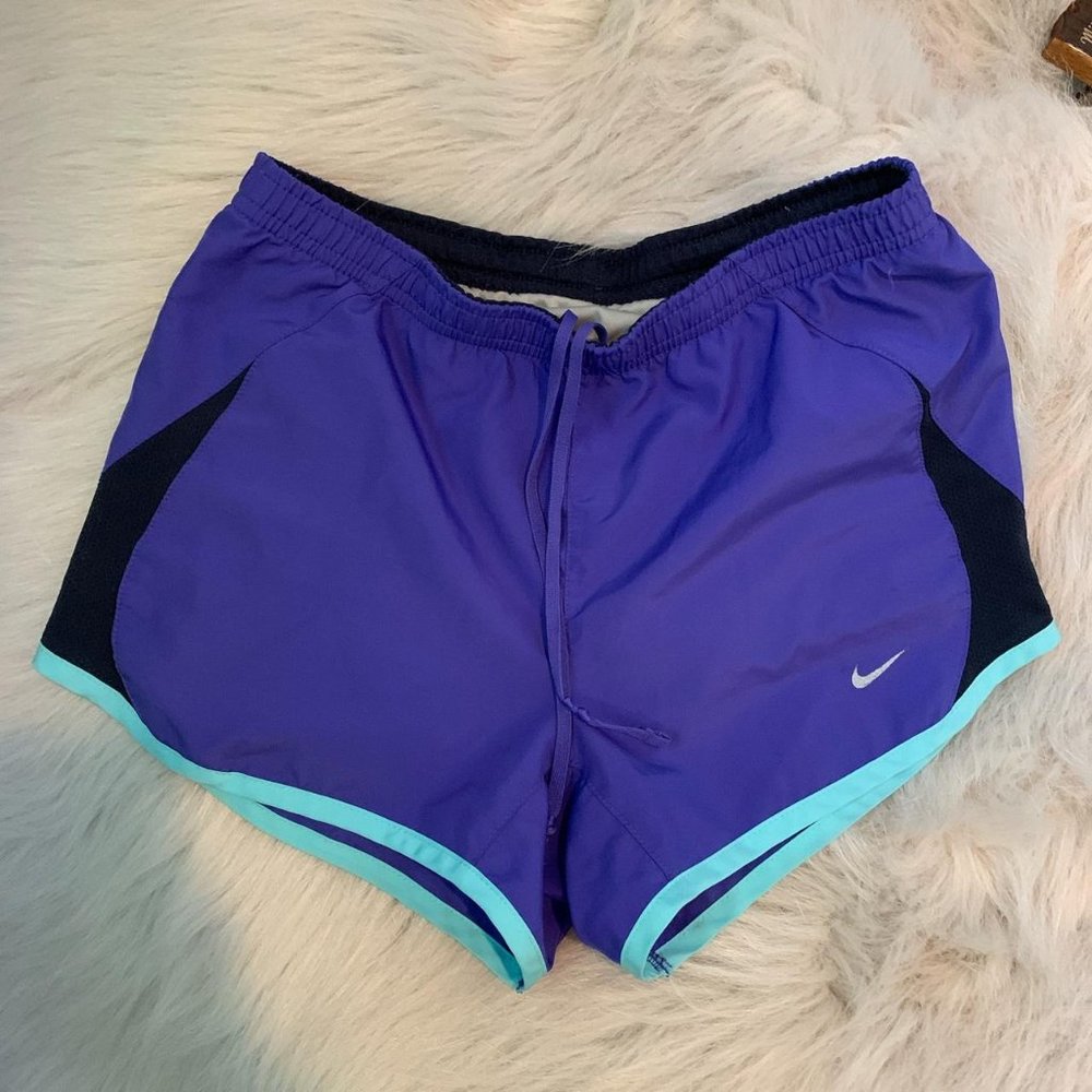 purple Nike shorts